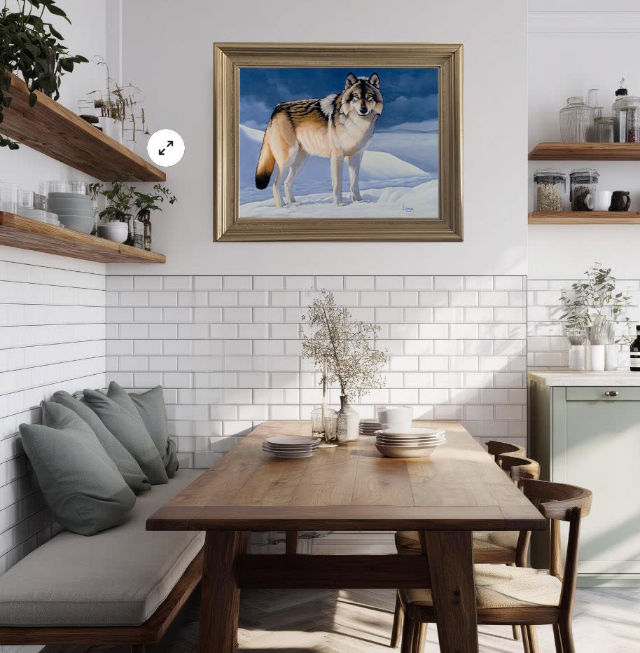 An original Bill Langis wolf painting hung in a furnished room